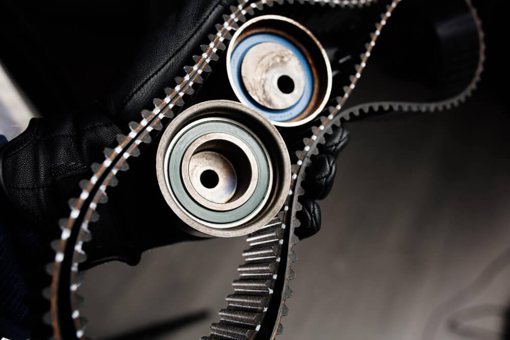 timing-belt-tension-rollers-hand-auto-mechanic-1